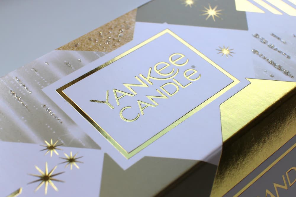 Yankee Candle packaging with gold foil blocking.