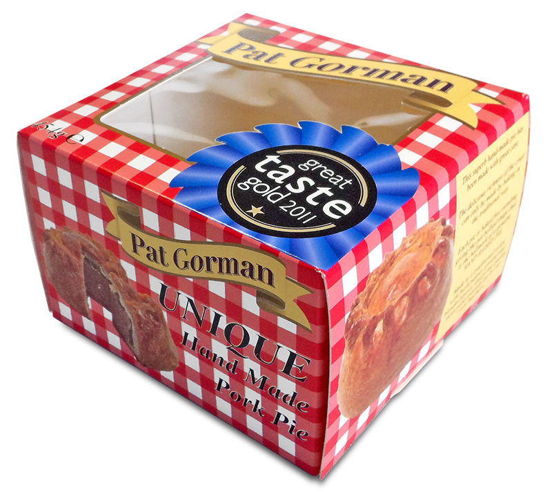 A box for Pat Gorman pork pies with a gingham pattern and a plastic window.